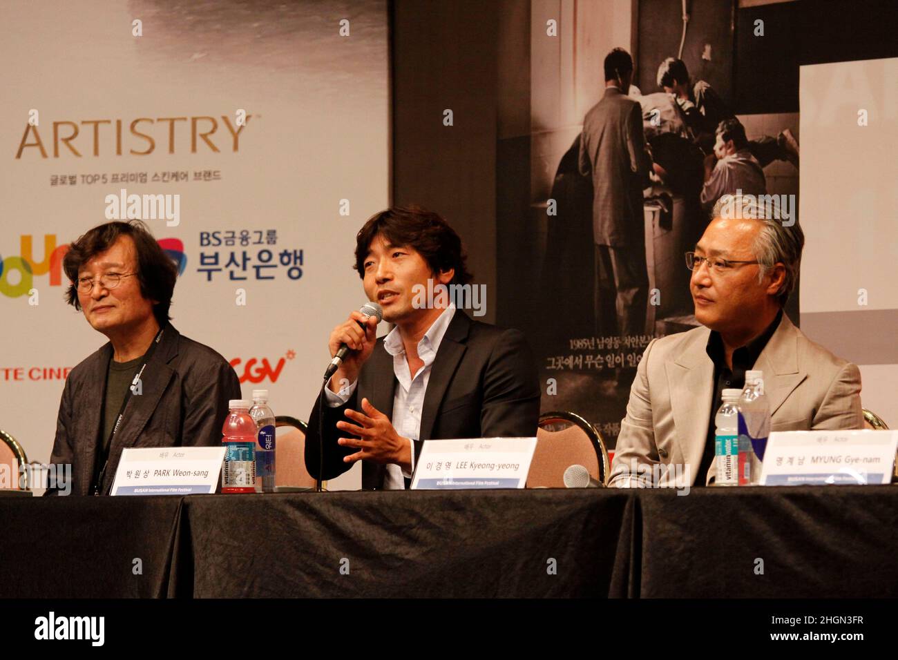 October 6, 2012 - Busan, South Korea : (From lest) Director Chung Ji Young, Actor Park Weon Sang and Lee Kyeong Yeong attend their new film `National Security 1985` Gala Presentation event at the CGV Theater. The film based on the memoir of a democracy activist who was tortured in the 1980s by South Korea's military rulers is provoking discussion about the country's not-so-distant authoritarian past and the influence it will have on this year's presidential election. (Ryu Seung-il / Polaris) Stock Photo